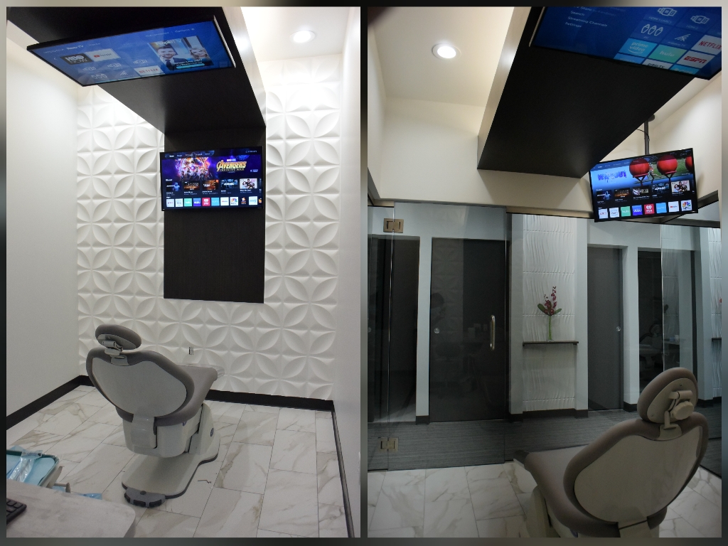 Dental treatment rooms with wall and ceiling televisions